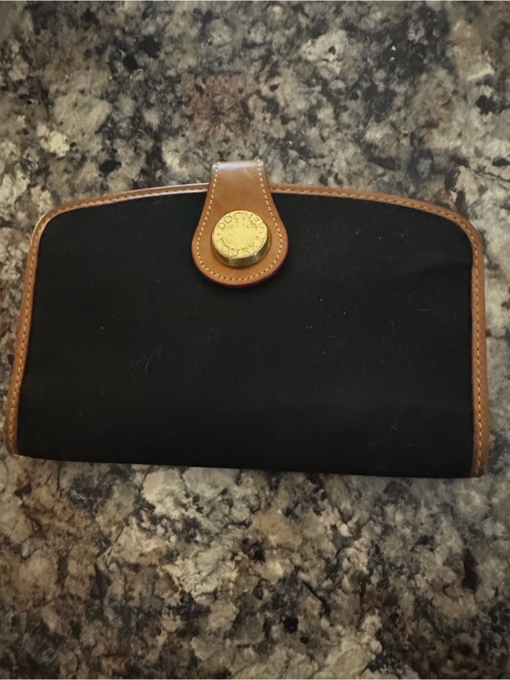 Dooney & Bourke Black Canvas Wallet with Brown Leather Trim and Brass Button